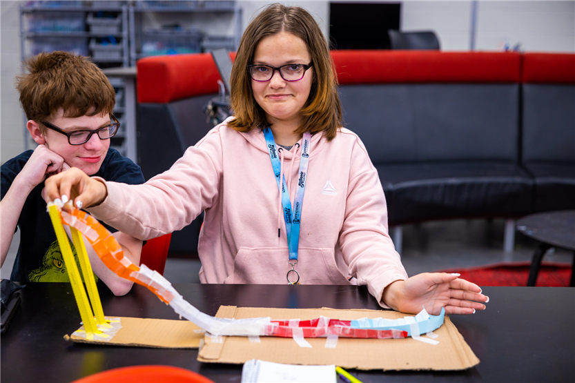 Students build paper rollercoasters